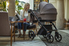 Roan Ivi 2.0 Vintage Wózek Głęboko-Spacerowy Lobster + Cybex Aton B2 i-Size Fotelik Samochodowy 0-13kg + Baza One Volcano Black