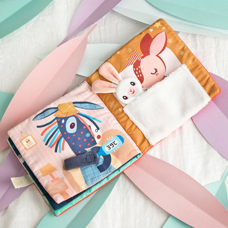 LILLIPUTIENS Miękka książeczka aktywizująca z mini-komforterem „Stella i jej przytulanka” 12 m+