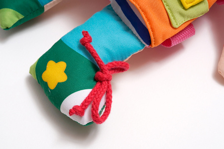 Training2s Zabawka Edukacyjna - Przytulanka/Lalka Do Ubierania - Dwustronna