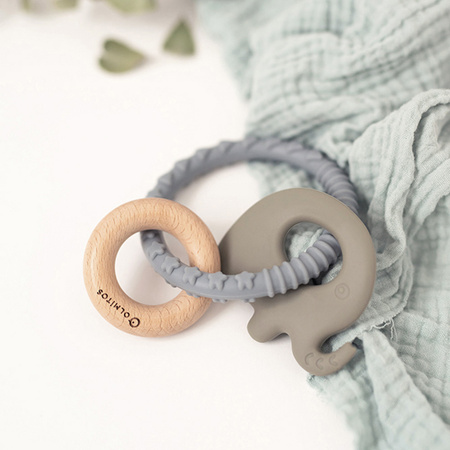 Olmitos Gryzaczek silikonowo-drewniany z kółkiem słoń zielony