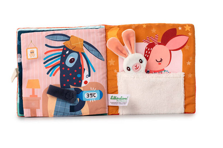 LILLIPUTIENS Miękka książeczka aktywizująca z mini-komforterem „Stella i jej przytulanka” 12 m+