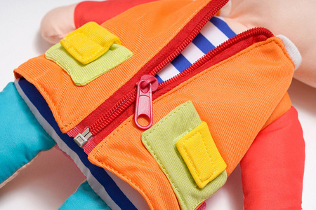 Training2s Zabawka Edukacyjna - Przytulanka/Lalka Do Ubierania - Dwustronna