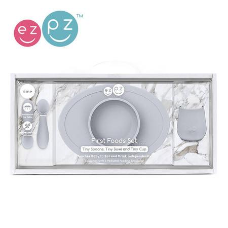 EZPZ Komplet pierwszych naczyń silikonowych First Foods Set pastelowa szarość + kubeczek Tiny Cup pastelowa szarość GRATIS