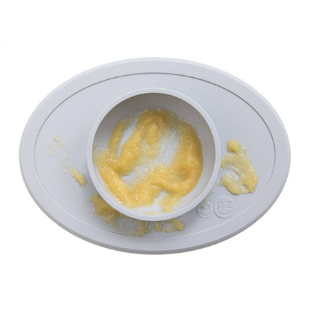 EZPZ Komplet pierwszych naczyń silikonowych First Foods Set pastelowa szarość + kubeczek Tiny Cup pastelowa szarość GRATIS